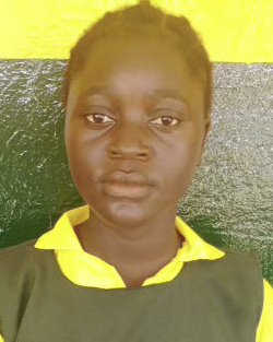 Ruth Kpamah in a yellow shirt and black vest