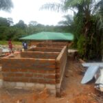 Brick wall under construction in Africa.