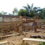 Unfinished brick house under construction.