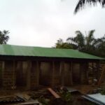 Unfinished building with green roof